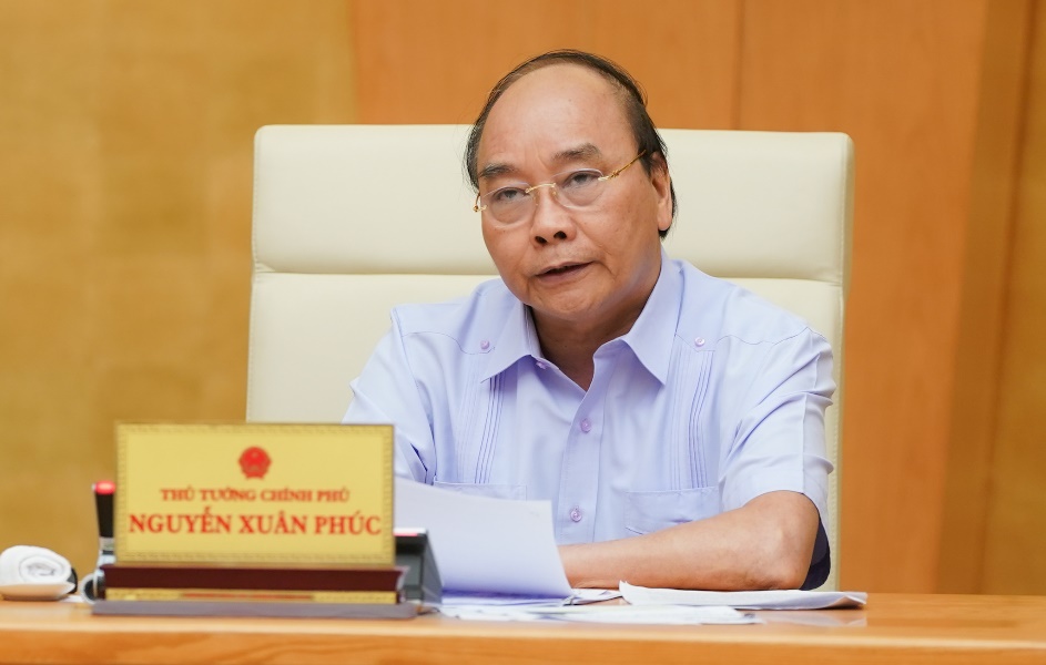 Thủ tướng Nguyễn Xuân Phúc phát biểu  tại cuộc họp. Ảnh: QUANG HIẾU